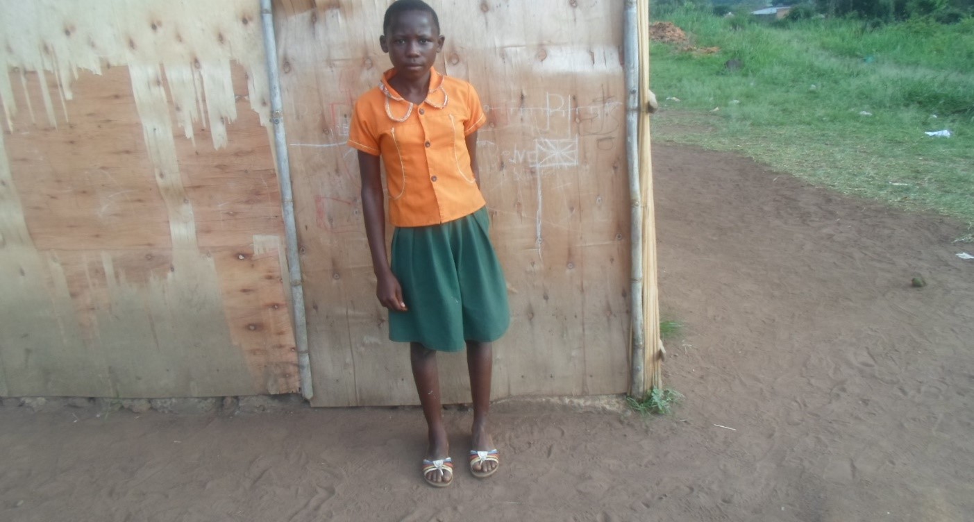 Phiona Tumuhaise. 11 years.